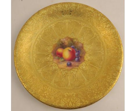 A Royal Worcester acid gilt plate, painted to the centre with fruit by H Price, signed, diameter 9.25ins - Good condition
