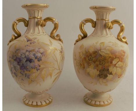 A pair of Royal Worcester gilded ivory vases, decorated with shot silk flowers to gilt borders, and having two serpent twist 