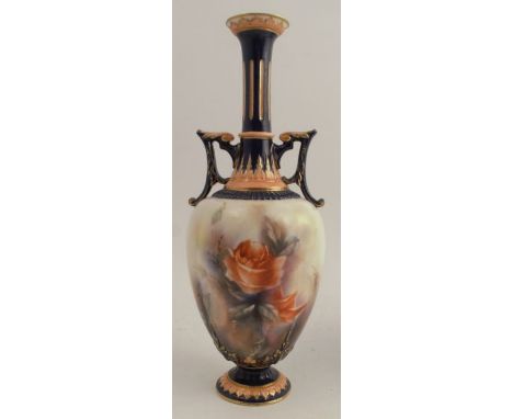 A Hadleys Worcester vase, decorated with roses, the neck, handles and base in navy and peach, height 10ins -&nbsp;Good condit