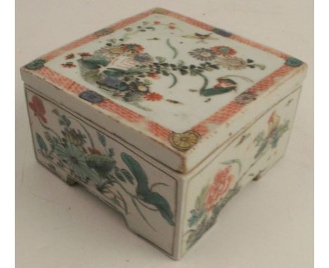 An 18th century Chinese Kangxi covered box, of square form, with lotus and aster floral decoration, width 4ins - heavily rest