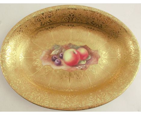 A Royal Worcester acid gilt oval dish, painted to the centre with fruit by H Price, signed, length 10.5ins&nbsp;- Good condit