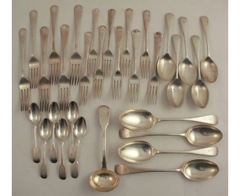 A set of six silver dinner forks, engraved with an initial, Birmingham 1928, weight 14oz, together with a set of four silver 