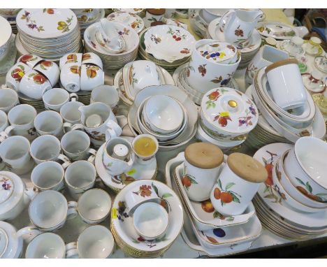 An extensive collection of Royal Worcester Evesham pattern dinner and tea ware, including cups and saucers, mugs, plates, ser