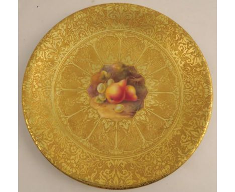 A Royal Worcester acid gilt plate, painted to the centre with fruit by H Price, signed, diameter 9.25ins - Good condition