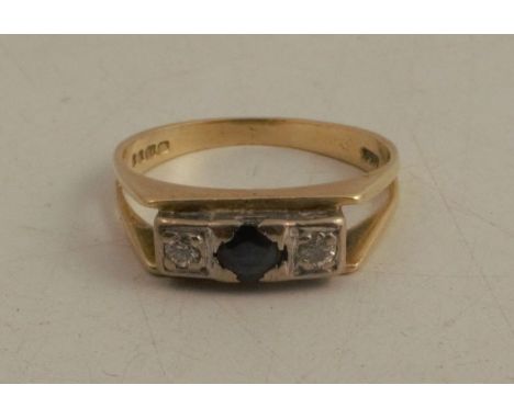 A three stone sapphire and diamond 18 carat gold ring, finger size K 1/2, 3.2g gross