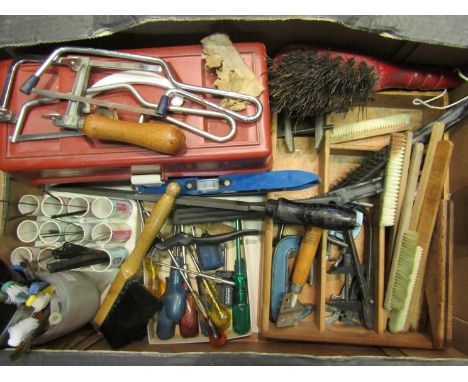 A box of mixed hand tools including screwdrivers, junior hacksaws and piercing saw with spare blades, brushes, crows foot, pl