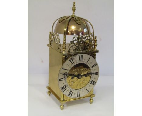 A late 19th/early 20th Century brass lantern clock of 18th Century design with Roman silvered chapter ring, twin fusee moveme
