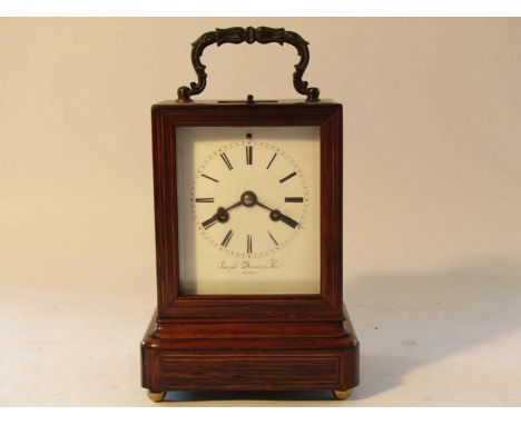 A 19th Century French rosewood and satin inlaid mantel clock, enamelled Roman dial (hairlined and chipped) signed Jospeh Dixo