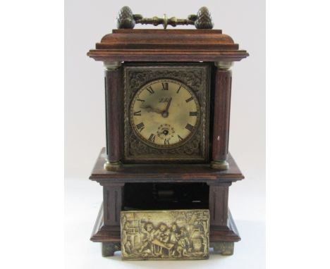 An early 20th Century German musical/alarm mantel clock with brass Roman dial, architectural form case and cast brass handle 