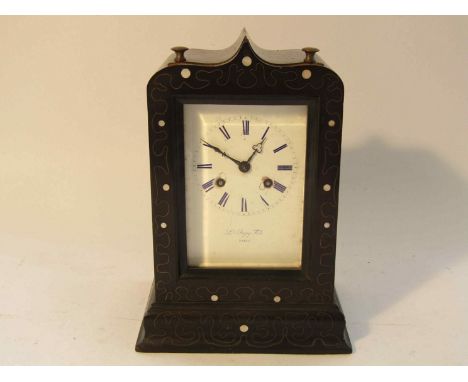 A 19th Century French ebonised mantel clock, enamelled Roman dial (a/f) signed Les Japy Fils, Paris, 8 day movement striking 