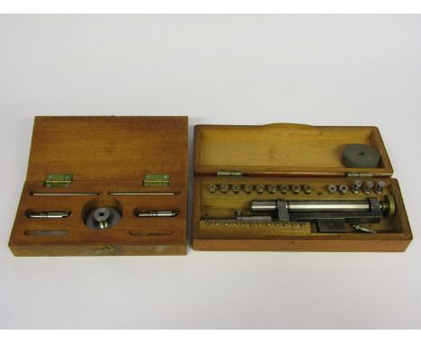 A G. Boley screw head polishing tool with various collets and attachments, together with a balance roller removing tool, both