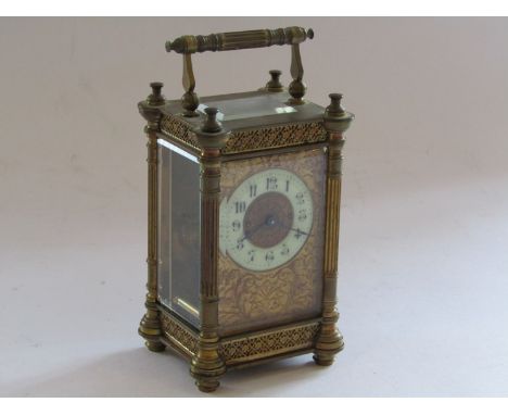 A late 19th Century French brass carriage timepiece with architectural design column and pierced case, Art Nouveau influenced