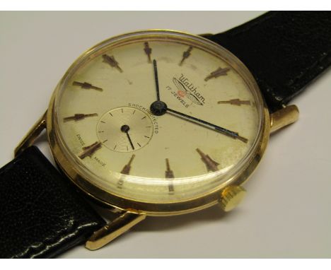 WALTHAM: a gent's manual wind wristwatch in steel and gold plated case (back with scratches), silvered dial (stained) with gi