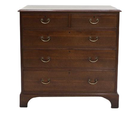A George III Oak Straight-Front Chest of Drawers, late 18th century, the moulded top above two short and three long pine-line