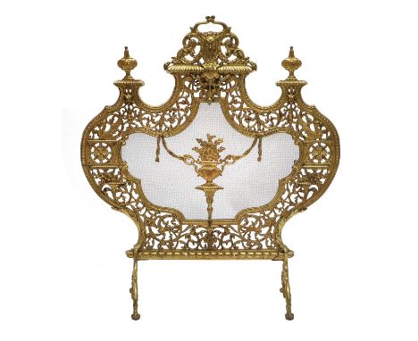 A Late 19th/Early 20th Century French Brass Firescreen, of cartouche-shaped form with steel mesh centred by an urn issuing fl