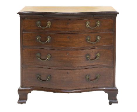 A George III Mahogany Serpentine-Front Bachelor's Chest, late 18th century, the moulded top above a pull-out brushing slide w