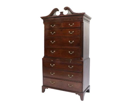 A George III Mahogany and Oak-Lined Chippendale-Style Chest on Chest, late 18th century, the broken swan neck pediment above 