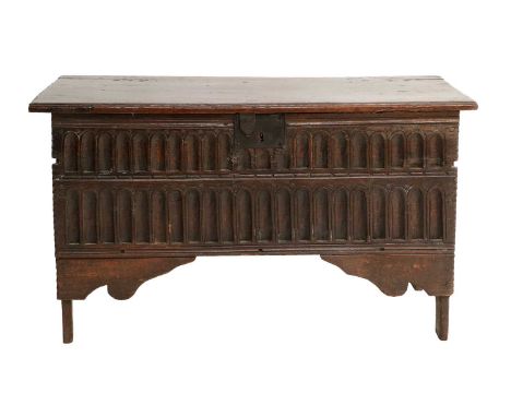A Charles II Oak Chest, late 17th century, the hinged lid with a moulded and chip-carved border enclosing a candle box above 