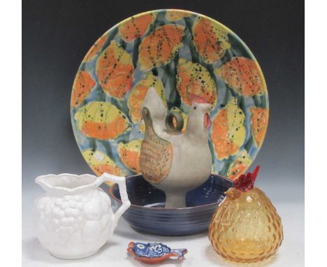 A very large modern pottery bowl decorated with shells in orange and yellow; a stoneware chicken, a glass murano style chicke