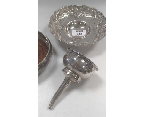 A collection of silver including wine funnel, bottle coaster, tea caddy etc., together with a continental silver bowl, 663g (