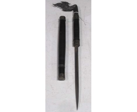 An Eastern short sword, possibly Sumatran, circa 1900, with shaped pommel and 24.5cm straight blade, ebony scabbard with niel