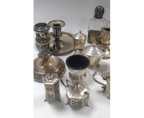 st  A collection of silverware including cruets, sauce boats, bottle labels, waiter, flatware etc, 1644g, (53ozt) weighable s