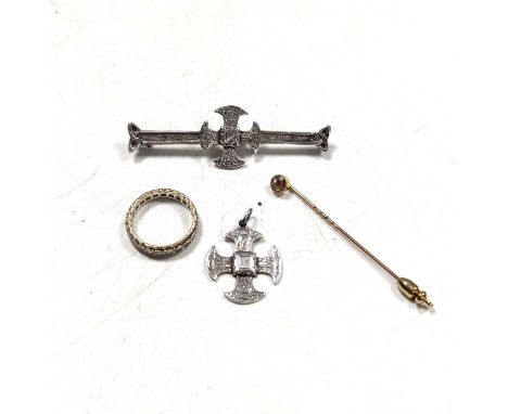 A synthetic spinel full eternity style ring stamped '9CT', and a topaz stick pin tested as 9ct and 18ct gold gross weight 5.9