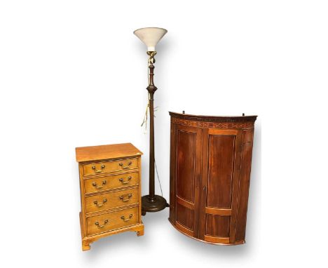 An Edwardian mahogany bow fronted corner cupboard, 111 x 78cm, together with a modern chest of four long drawers, 77 x 53 x 4