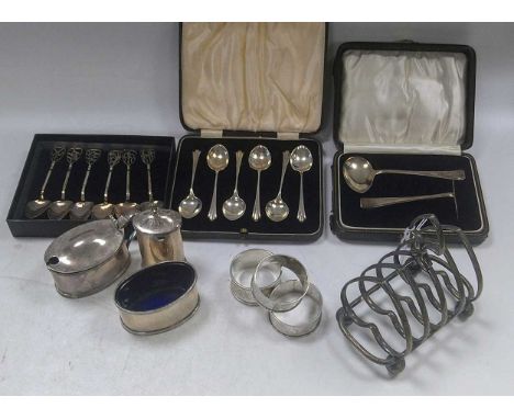 A collection of silverware including flatware, toast rack, napkin rings, spoon &amp; pusher etc 728g (23ozt) gross weighable 