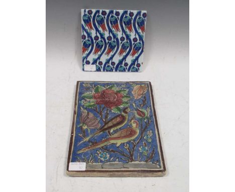 Iznik pottery tile with repeating tulip design in undulating form, 20 x 20cm, also another with birds in the Tree of Life, 33