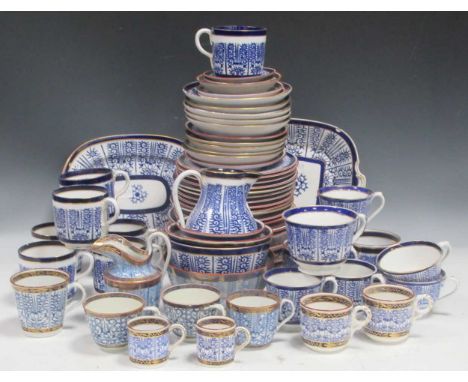 An Edwardian Royal Worcester dinner and tea service, of blue and white foliate design with gilt rims (qty)Printed lily patter