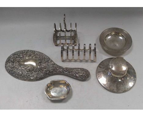 A collection of silverware including toast racks, an inkwell, cream jug hand mirror etc., 433g (14ozt) weighable silver, toge