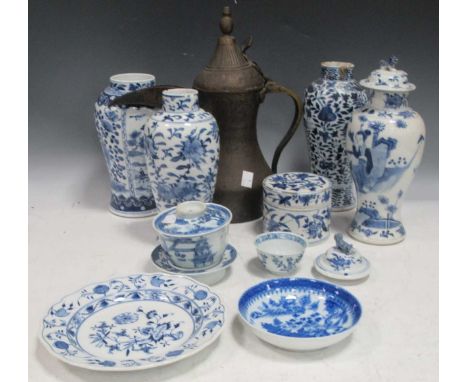 A collection of blue and white Chinese vases &amp; bowls, 19th century and later; Kang Xsi style tea bowl with floral sprigs;