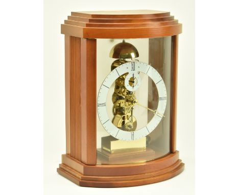 Kieninger, Germany - A 20th century continental 24 hours movement skeleton mantle clock. The clock having a mahogany case wit