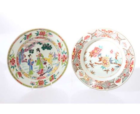 TWO CHINESE QIANLONG FAMILLE ROSE PLATES, each circular and enamel painted, the first with figures and a deer, the second wit