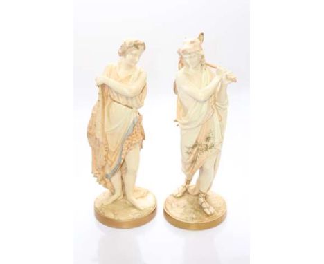 A LARGE PAIR OF ROYAL WORCESTER FIGURES OF A HUNTER AND HUNTRESS, each modelled carrying their quarry, puce printed and impre