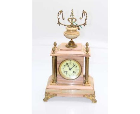 A FRENCH GILT-METAL MOUNTED MARBLE MANTEL CLOCK, 19TH CENTURY, with urn surmount, the case with four reeded columns, the dial