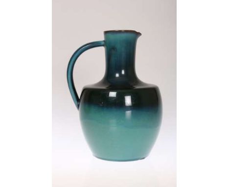 A LINTHORPE POTTERY JUG, DESIGNED BY CHRISTOPHER DRESSER, with blue/turquoise glaze, no. 182, facsimile signature, impressed 