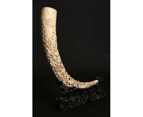 A SUPERB CHINESE CARVED IVORY TUSK, 19TH CENTURY, the panel with a Tang Dynasty poem by Wang Changlin (698-758), the elaborat