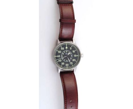 A LACO STAINLESS STEEL MILITARY TYPE WRISTWATCH, the circular dial with luminous outer minutes, inner hours, hands and centre