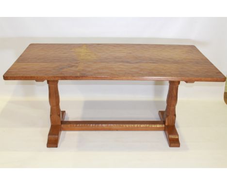 AN ALBERT "EAGLEMAN" JEFFERIES OAK DINING SUITE, the 5'6" table with adzed rectangular top, raised on a trestle base, signed,