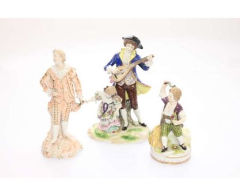 A LUDWIGSBERG PORCELAIN FIGURE GROUP, modelled as father and child in 18th Century dress, he stands playing a lute while she 