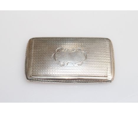 A VICTORIAN SILVER SNUFF BOX, Edward Smith, Birmingham 1858, of rounded rectangular form with engine turning and vacant carto