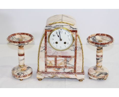 AN ART DECO MARBLE GARNITURE DE CHEMINEE, the clock with two-train movement, the white enamel dial with Roman numerals, toget