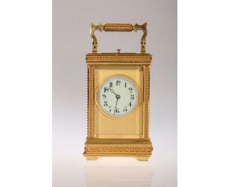 A 19TH CENTURY BRASS CASED STRIKING AND REPEATING CARRIAGE CLOCK, the cornice case enclosing a circular enamel dial with Arab