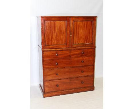 A HOLLAND & SONS MAHOGANY TALLBOY, MID 19TH CENTURY, with a pair of panel doors over two short above three long graduated dra