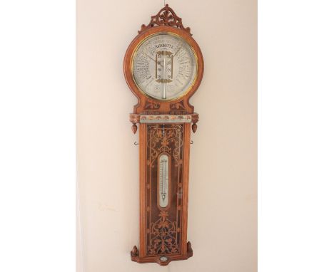 AN AMERICAN OAK FORECAST BAROMETER, c.1880, the 9½ inch silvered dial, signed "JOSEPH DAVIS & CO, 6 KENNINGTON PARK ROAD, LON