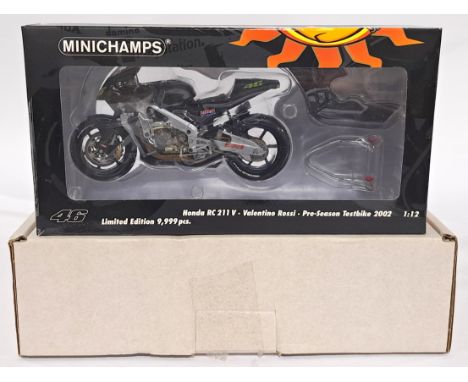 Minichamps 122027946 1/12 scale - "Valentino Rossi" Honda RC211V - Pre-Season Testbike 2002. Conditions generally appear Near