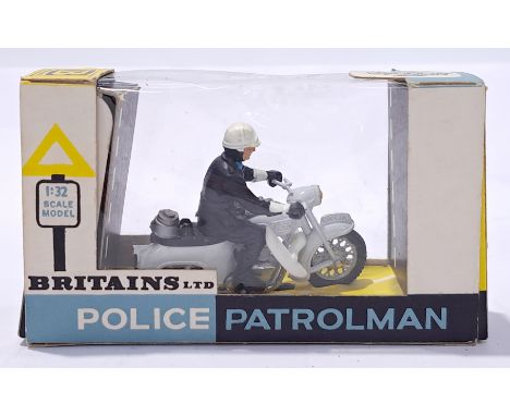Britains 9697 "Police Patrolman with Loud Hailer" - white motorcycle with dark blue figure, white helmet. Conditions generall