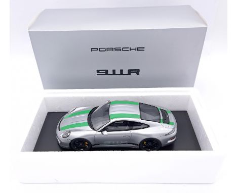 Spark (Minimax), a boxed 1/18 scale Porsche 911R. In Metallic Silver with Green stripe detailing. Model is mounted on elegant